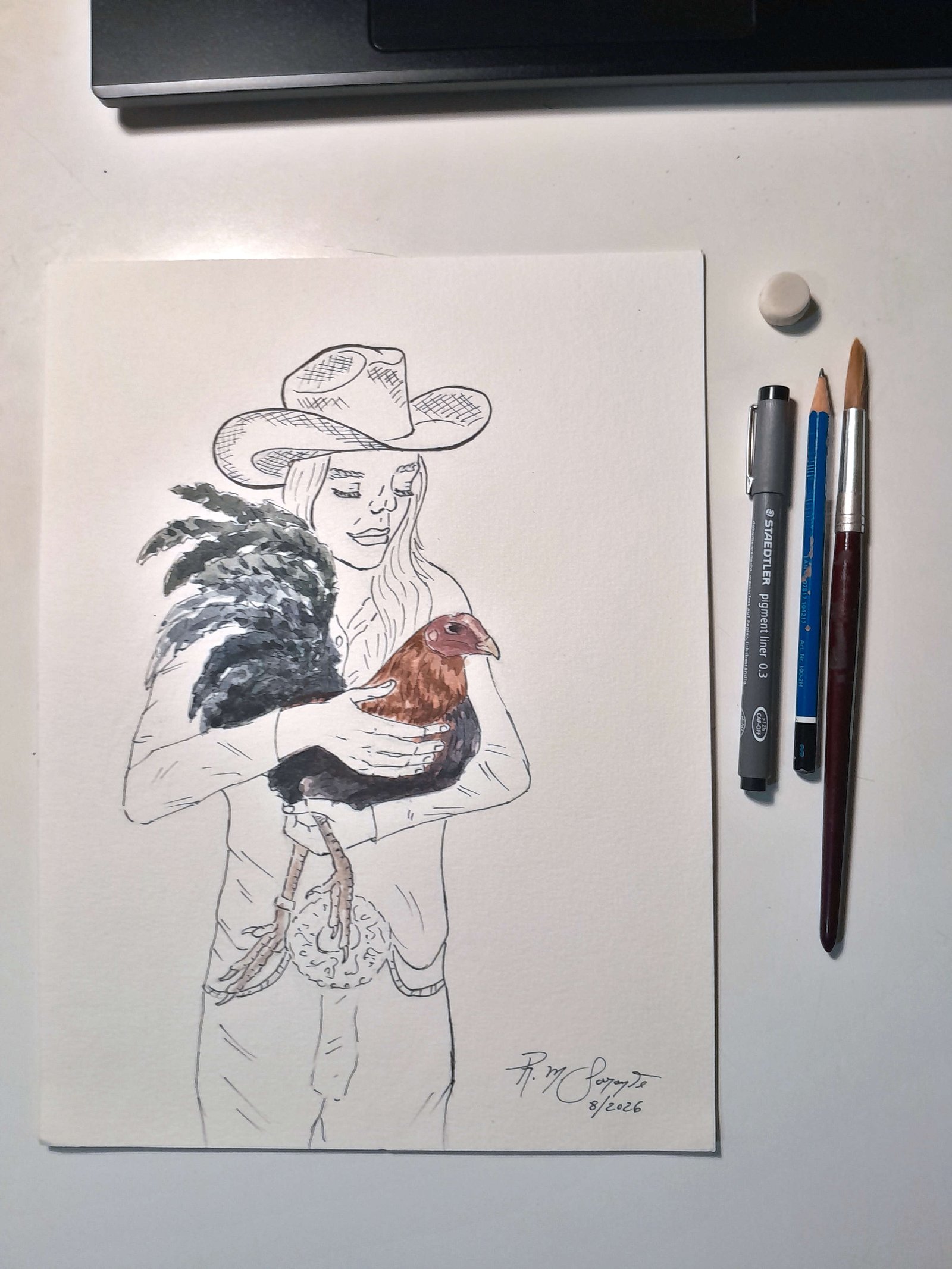 View of Cockfighter No. 1 on a work surface alongside a technical pen, pencil, brush, and eraser, showing the materials associated with the artwork.