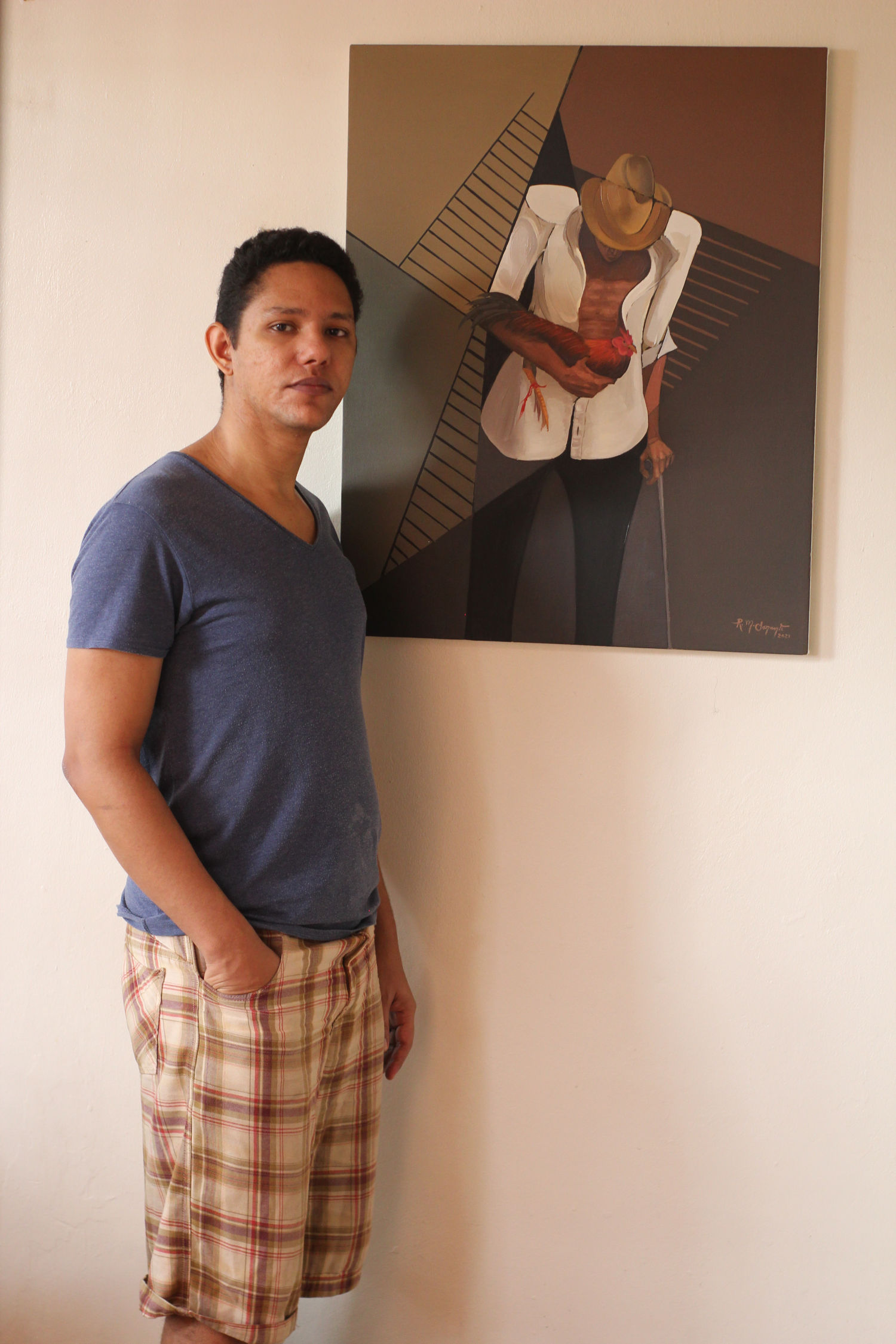Artist standing beside the completed oil painting "Gallero," illustrating the artwork's scale and presentation on a gallery wall.