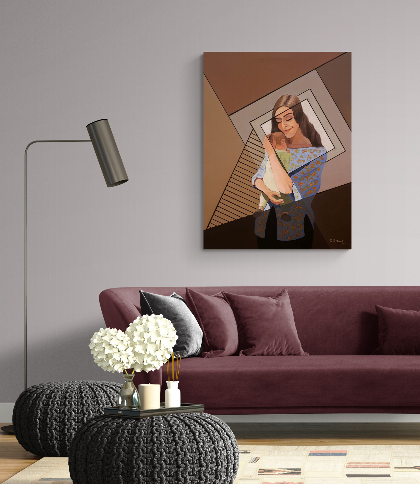 The painting "Maternity" displayed above a modern sofa in a contemporary living room, illustrating the artwork in a residential interior.