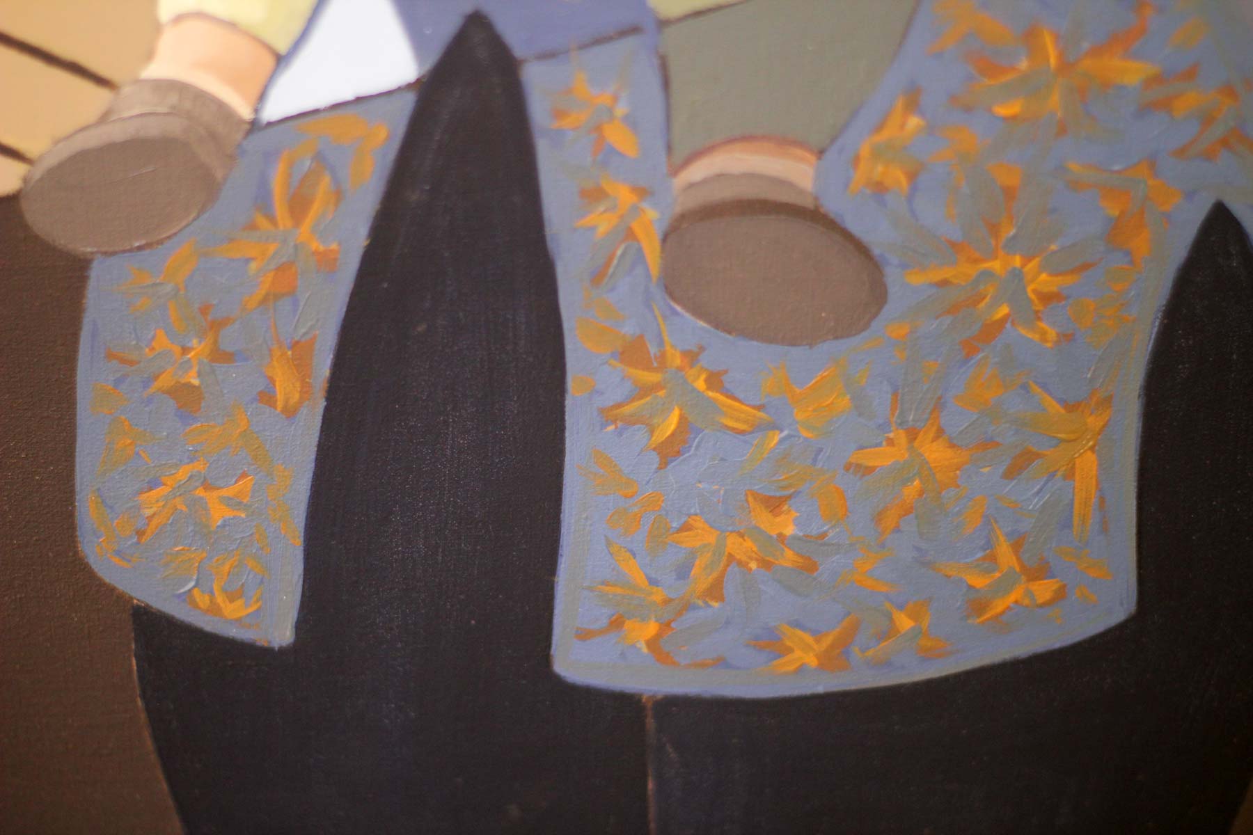 Close-up of the mother's blue floral blouse beneath the baby's feet, featuring expressive orange floral motifs and visible oil brushstrokes.